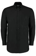A Kustom Kit KK351 long-sleeve button-up shirt in black, featuring a chest pocket, displayed on a plain white background.