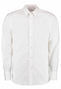 Kustom Kit's KK386 is a long-sleeved white button-up shirt with a collar displayed on a plain background.