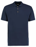The KK400 from Kustom Kit is a plain navy blue polo shirt with short sleeves and a classic collar. It includes a three-button placket and offers a simple, casual style.