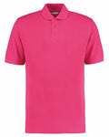 A vibrant pink KK403 polo shirt by Kustom Kit features a collared neckline and a three-button placket. With short sleeves and a solid color, it offers a casual yet neat appearance. The shirt is showcased against a white background.