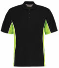 Introducing the Gamegear KK475: a stylish black polo shirt with lime green accents. This shirt features short sleeves, a buttoned collar, and distinctive contrasting side panels.