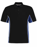 The Gamegear KK475 is a black polo shirt with a collar and three buttons, featuring blue side panels accented by white piping along the seams for a sporty look.