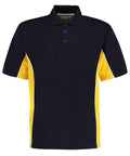 Introducing the Gamegear KK475: a black polo shirt with short sleeves, enhanced by yellow side panels and complemented by white trim accents.