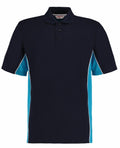 The product is the Gamegear KK475, a polo shirt featuring black fabric with blue side panels and white piping details, complete with a collar, buttoned placket, and short sleeves. It is showcased against a plain white background.