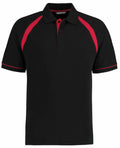The KK615 by Kustom Kit is a black polo shirt featuring red accents on the shoulders and sleeve edges.