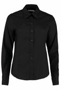 The KK702 shirt by Kustom Kit is a black long-sleeve button-up with a pointed collar, ideal for formal or business settings.