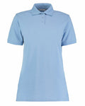 Kustom Kit's KK703 is a light blue polo shirt featuring short sleeves and a three-button placket, presented against a simple white background.