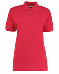 Kustom Kit's KK703 red polo shirt featuring short sleeves and a buttoned collar, showcased against a plain white background.