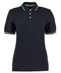 The KK706 by Kustom Kit is a plain polo shirt featuring short sleeves, a collar, and button placket with distinctive white trim on the collar and sleeve edges.