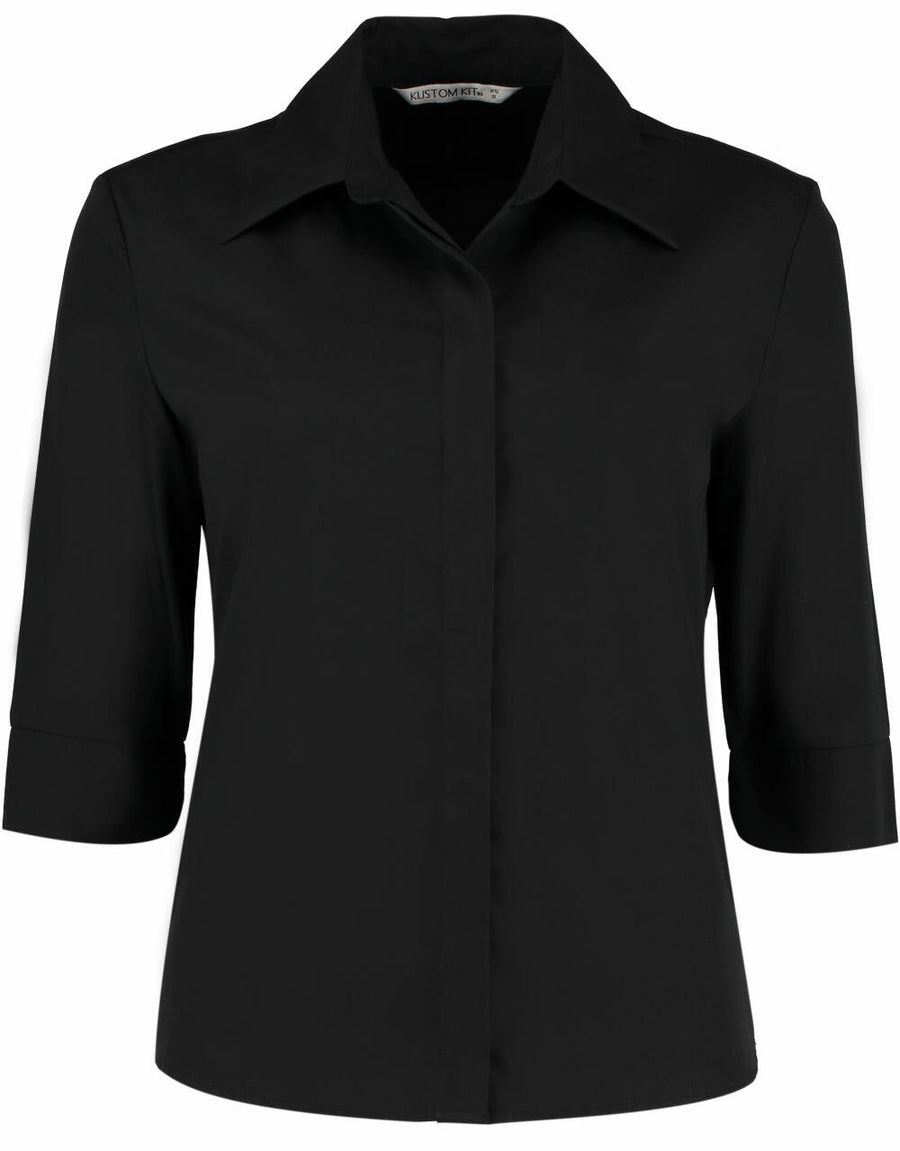 The KK715 by Kustom Kit is a black, long-sleeve button-up shirt featuring a collar and cuffed sleeves.