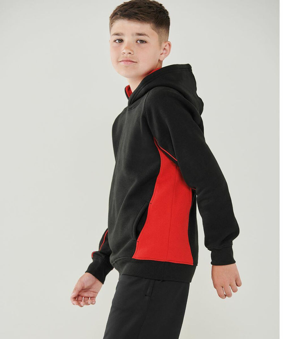 A boy stands sideways wearing a Finden & Hales LV339 with red accents, looking at the camera.