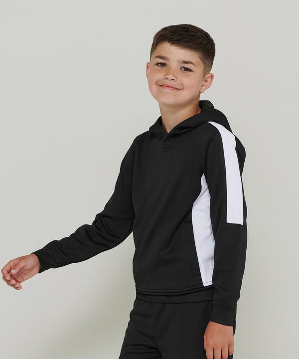 Young boy wearing a Finden & Hales LV342 hoodie, smiling and looking towards the camera against a plain background.