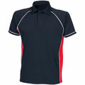 The Finden & Hales LV370 is a black polo shirt featuring red side panels and white piping along the sleeves.