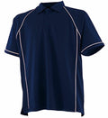The LV370 by Finden & Hales is a navy blue polo shirt with short sleeves, featuring white piping along the shoulders and sides, as well as a collar and button-up neckline.