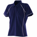 The Finden & Hales LV371 polo shirt features a dark blue color with white piping on the shoulders and sides. It has short sleeves and a buttoned collar.