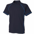 The Finden & Hales LV372 is a black polo shirt with short sleeves, highlighted by blue piping along the shoulders and sleeve edges. It features a classic collar and a three-button placket on the front.