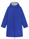 Introducing the Finden & Hales LV691: a stylish blue hooded raincoat featuring a convenient front zipper. The coat includes long sleeves and a soft grey inner lining, crafted from lightweight fabric perfect for wet weather. Displayed elegantly against a plain white background, it offers both functionality and fashion.