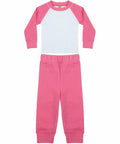 Larkwood LW71T child's outfit featuring a long-sleeve, raglan white and pink top paired with matching pink pants.