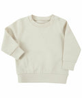 The Larkwood LW800 toddler-sized sweatshirt features a simple design in light beige, with long sleeves and a round neck. It includes snap buttons on one shoulder and has ribbed cuffs and hem for added style.
