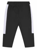 Larkwood LW830 athletic pants in black featuring white side stripes and an elastic waistband.