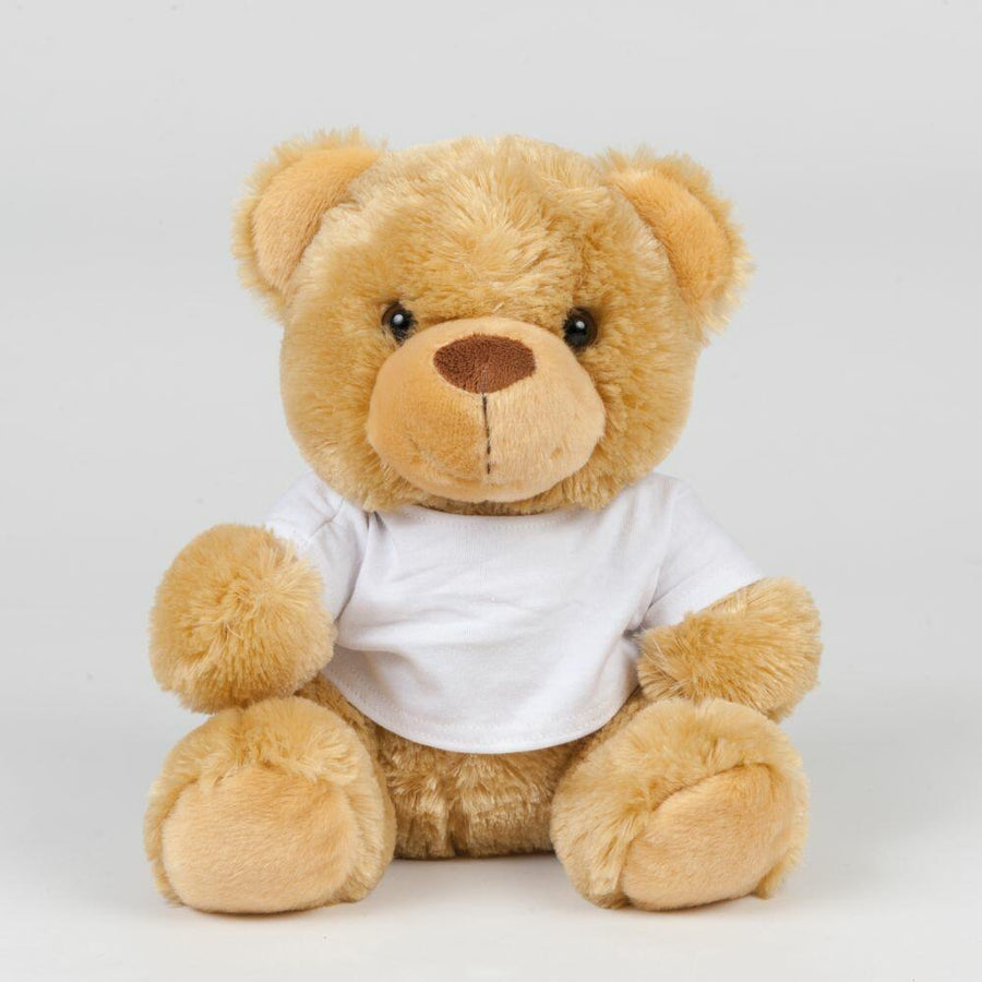 A Mumbles teddy bear, product MM030, is dressed in a white T-shirt and rests against a plain background.