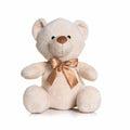 Product MM032, a beige plush teddy bear from Mumbles, featuring a brown polka-dot ribbon, is displayed against a white background.