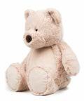 A soft, light beige teddy bear with a dark brown nose and rounded ears, sitting upright, from Mumbles and named MM051.