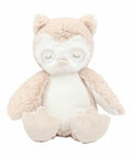 The Mumbles MM060 is a plush owl toy featuring closed eyes and a gentle smile. It boasts soft beige and cream fur, along with large wings and feet, and sits upright.