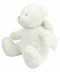 A white plush teddy bear, MM561 by Mumbles, sits upright, smiling, with wings attached to its back.
