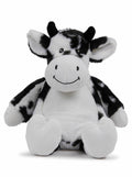 Introducing the MM578 by Mumbles: a delightful plush cow toy featuring a smiling face, floppy ears, small horns, and a charming black and white design, sitting upright against a plain background.