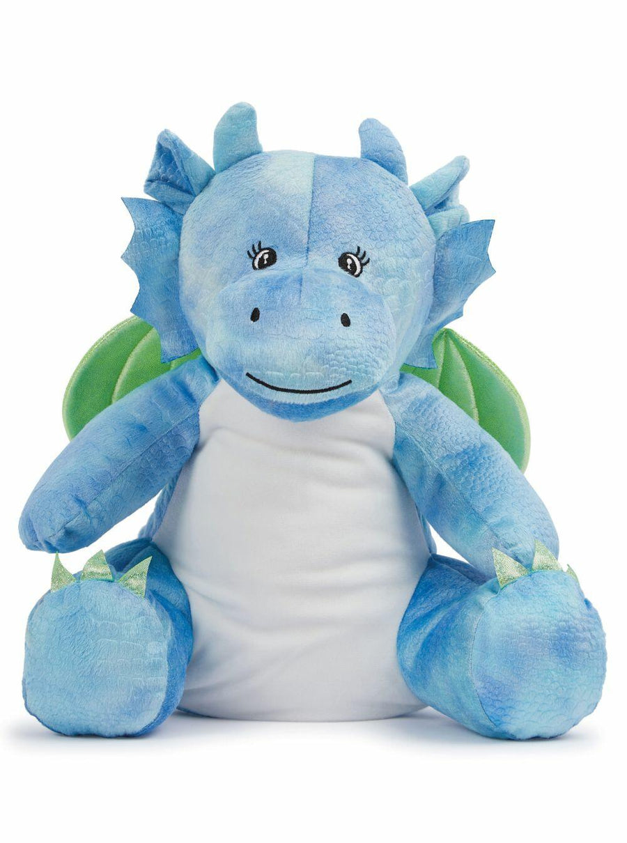 A Mumbles MM579 plush dragon toy, featuring blue fabric and green wings, in a sitting position.