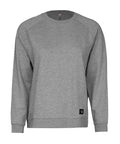 A grey, long-sleeved crew neck sweatshirt with ribbed cuffs and hem featuring a small black rectangular label sewn near the left bottom hem. Product: Sweatshirts.
