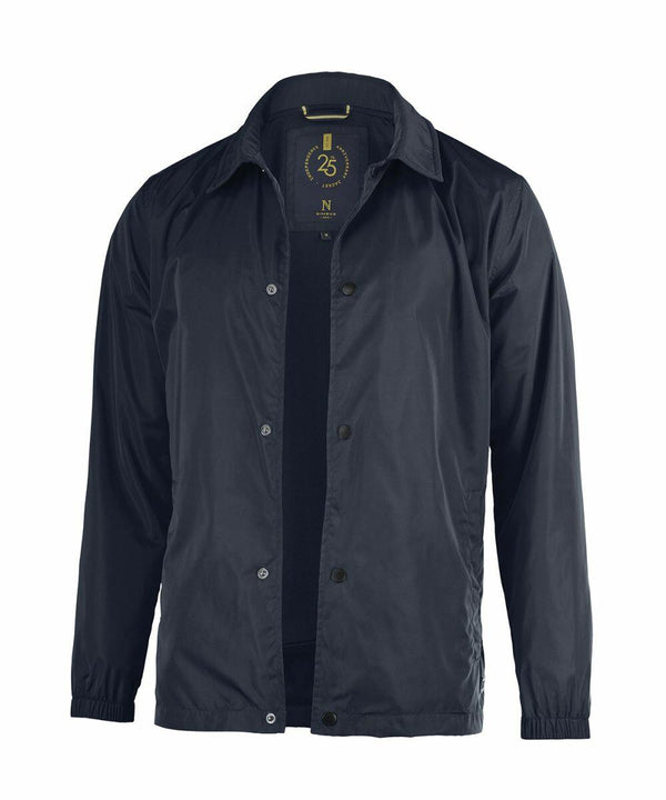 A Nimbus NB105 navy blue, long-sleeve jacket with a button-up front and collar. It has a 25-year logo and size label on the inside.