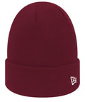The New Era NE002 beanie is a maroon knit hat featuring a small white embroidered logo on the side, complete with a folded brim. It is showcased against a plain white background.