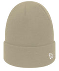 A beige NE002 knit beanie by New Era, featuring a folded cuff and a small white logo on one side.