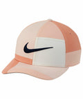 A multicolored baseball cap featuring the Nike logo in black on the front, identified as product NK324.