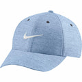 Nike's NK326 cap in light blue features a curved brim and ventilation holes on top, with a white Nike logo prominently displayed on the front.