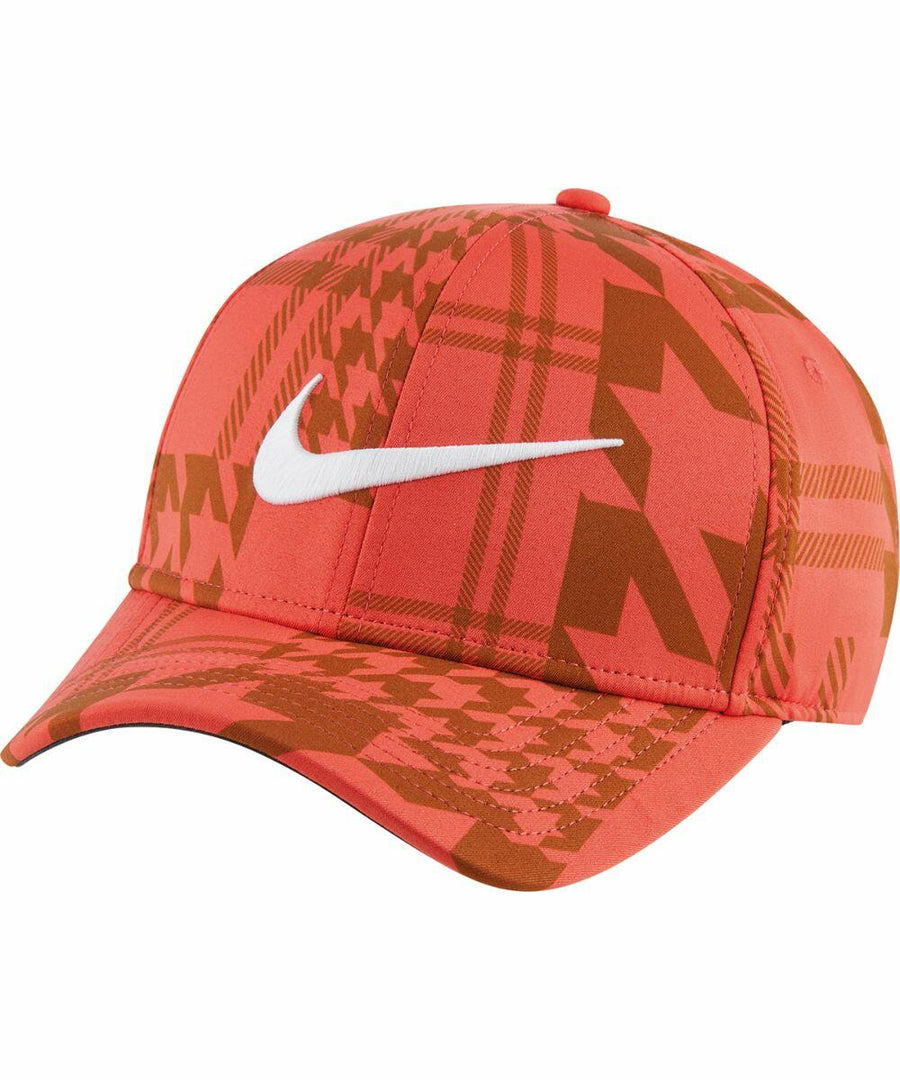 A red cap with an orange and brown pattern and a white Nike swoosh logo on the front, called NK327 by Nike.