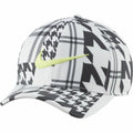 A Nike NK327 baseball cap featuring a black and white geometric pattern with a yellow logo on the front.