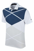 The Nike NK338 polo shirt features white and navy colors with geometric patterns and a small logo on the sleeve.
