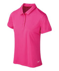 The NK344 is a pink short-sleeve polo shirt by Nike, featuring a collar, button placket, and a small logo on the bottom right.