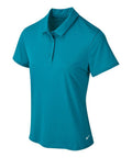 The NK344 is a teal polo shirt featuring short sleeves and a buttoned collar, with the distinctive Nike logo on the bottom right.