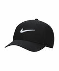 A black baseball cap with a curved brim, featuring a white Nike swoosh logo on the front, product name NK385 by Nike.