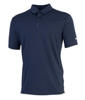 Polos: Navy blue short-sleeve polo shirt featuring a collar, three-button placket, and white Nike logo on the left sleeve. Displayed on a white background.
