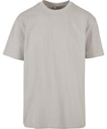 A plain, short-sleeved, light beige T-shirt is shown on a white background, featuring a crew neckline and no visible logos, patterns, or designs.