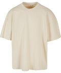 The T-Shirts product is an oversized, plain beige short-sleeve tee with a crew neck and no visible logos or designs, displayed against a white background.