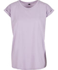 A T-Shirts product in plain light purple is shown on a white background. It features short sleeves with rolled cuffs and a round neckline.