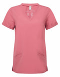 The NN310 scrub top by Onna by Premier is a pink short-sleeve design featuring two pockets and a V-neck, showcased on a plain white background.