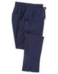 The NN600 scrub pants by Onna from Premier, featuring an elastic waistband, side pockets, and straight legs in navy blue, are displayed on a white background.