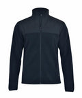 Introducing the Nimbus Play NP17M: a black fleece jacket featuring a full zipper, high collar, and long sleeves, beautifully showcased against a plain background.